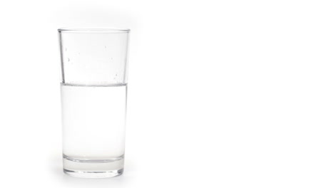 glass of water with ice isolated on white background