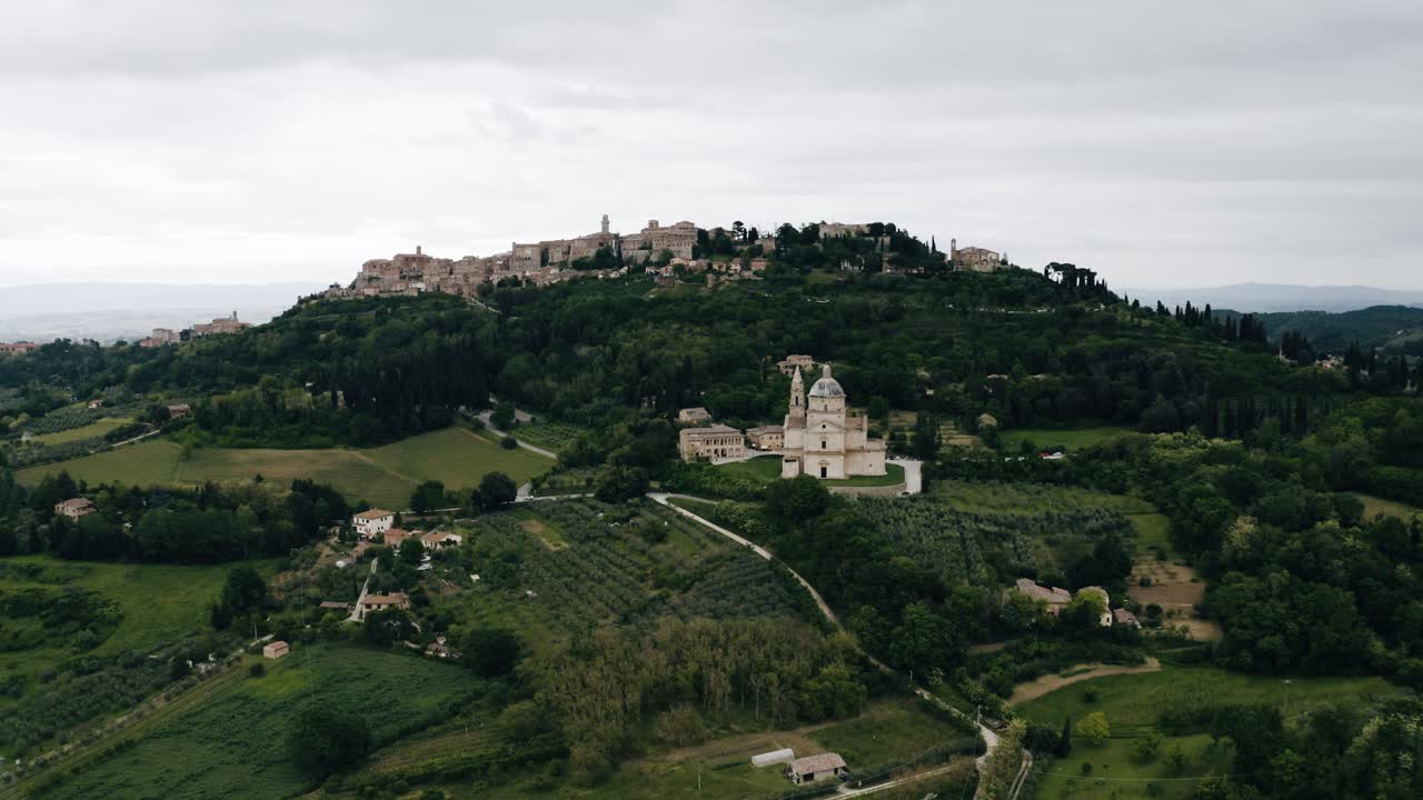 Wide aerial view of Italy's countryside with Sanctuary of the Madonna prominently featured