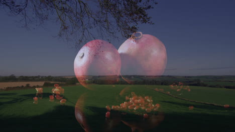 floating large apples over scenic countryside landscape with scattered smaller apples