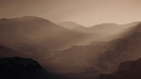 black-rocky-mountain-silhouette-in-deep-fog