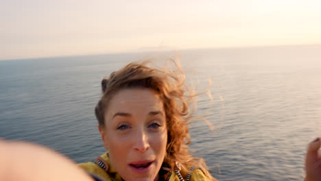 happy selfie on scottish cliffs