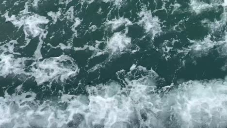 high speed sea waves and foam abstract background
