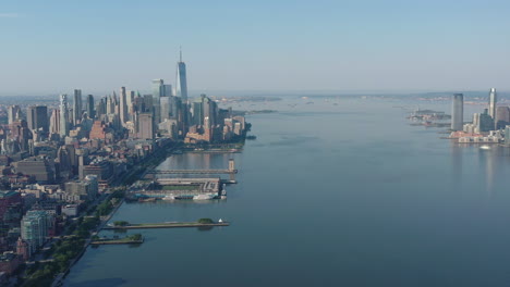 a drone view high over the hudson river early on a sunny morning