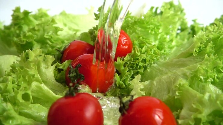 Washing of lettuce leaves. Slow motion.