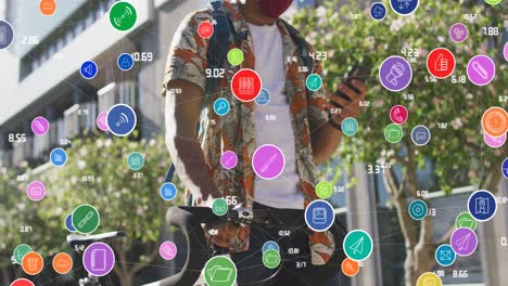 Animation-of-media-icons-over-african-american-man-using-smartphone