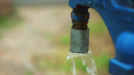 Close-up-detail-shot-of-hand-operated-fresh-water-well-pump-at-a-campground-in-Glacier-National-Park