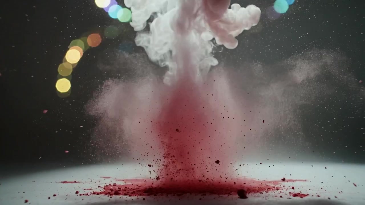 Rilascio di un impulso di gas che spinge un pennacchio di pigmento rosso e vapore bianco su una piattaforma da studio bianca per analisi.