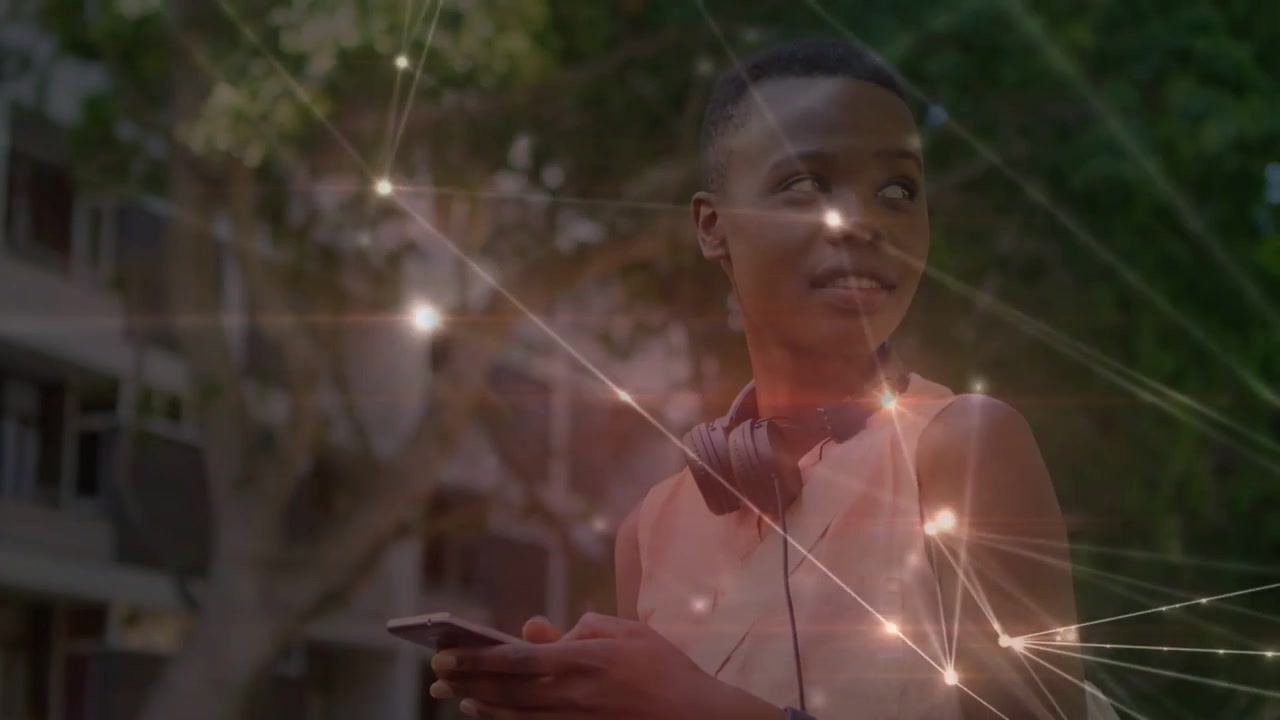 Young Black Woman Using Smartphone with Digital Network Overlay