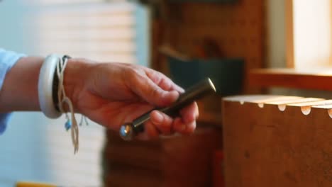 craftswoman working in workshop