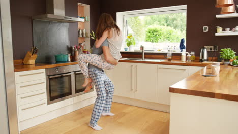 couple having fun in the kitchen