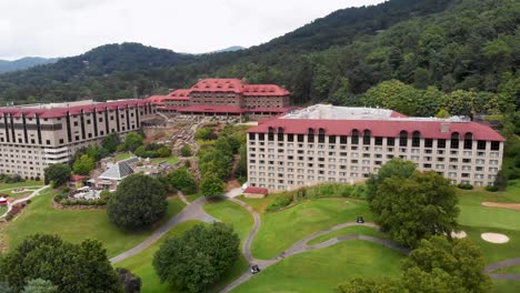 4k drone video of historic grove park inn in asheville, nc on sunny summer day