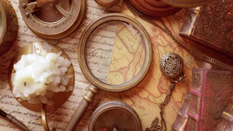 Vintage-style-travel-and-adventure.-Vintage-old-compass-and-other-vintage-items-on-the-table.