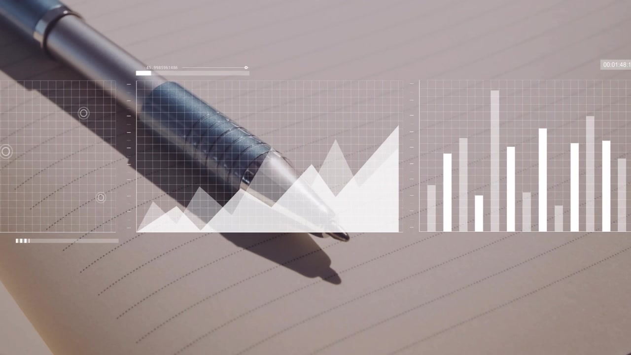 Metalpen hviler på en linjeret notesbogside, der viser et gennemsigtigt datagitter med område- og søjlediagrammer.