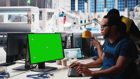 vertical video african american male engineer does troubleshooting on copy space display