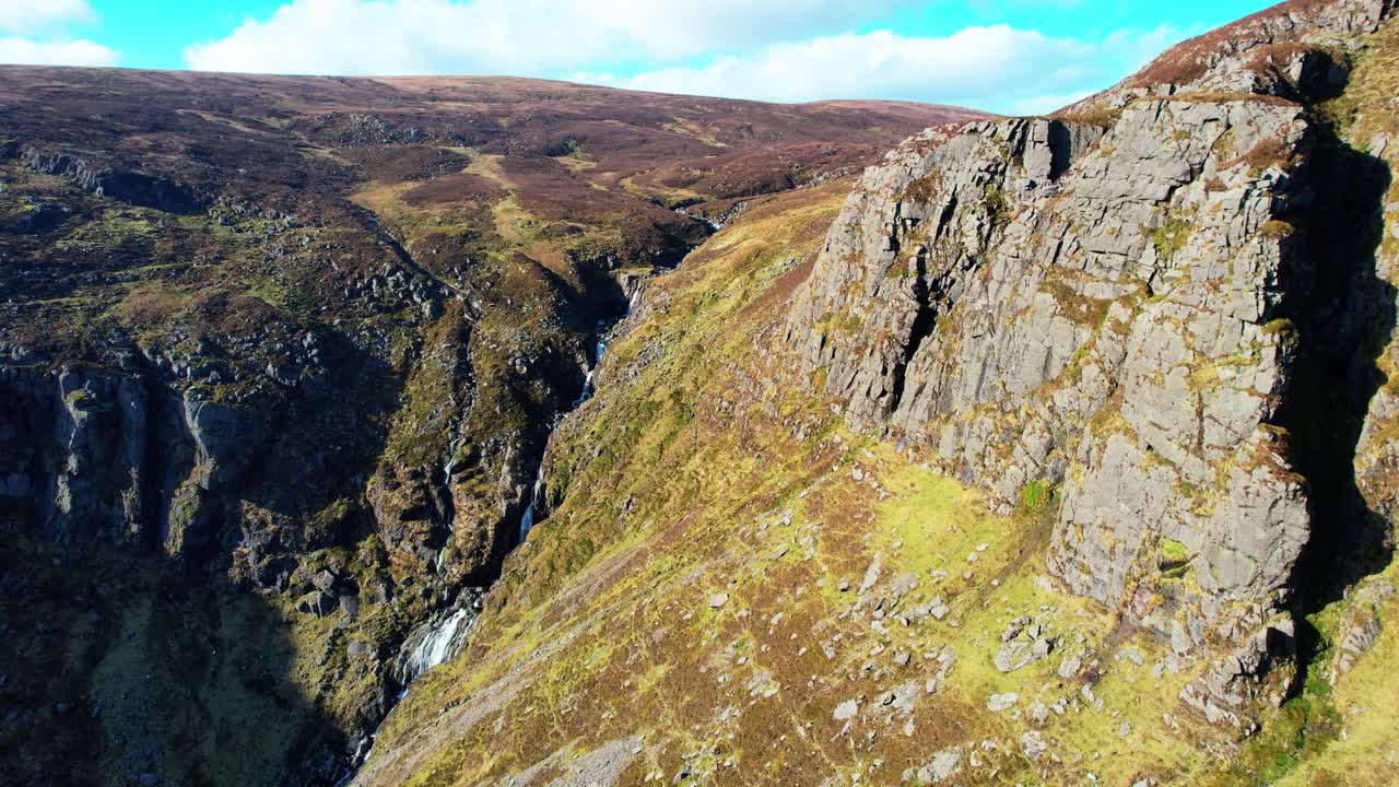 Irish Mountains dramatic steep cliffs and Mahon Falle Waterfall Comeragh Mountains Waterford Irish Epic Locations and Landscapes