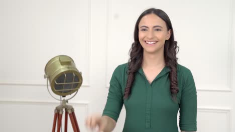 Indian-girl-showing-victory-sign