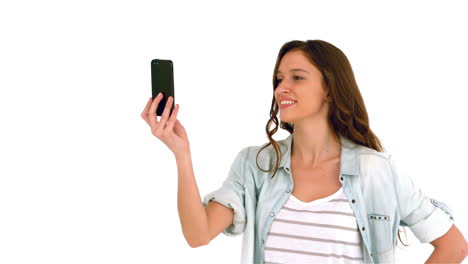 Smiling-woman-taking-selfie