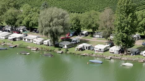 scenic campground along mosel river bank, winemaking region