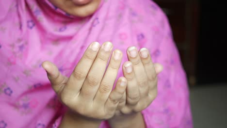 close up of muslim women hand praying at ramadan