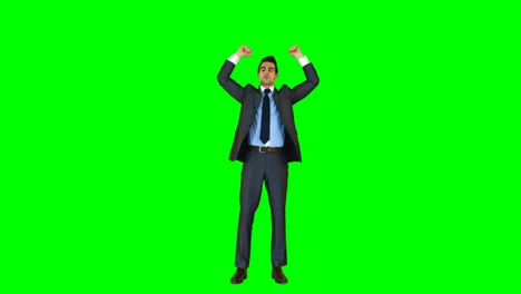 Businessman-standing-with-arms-up-against-green-background