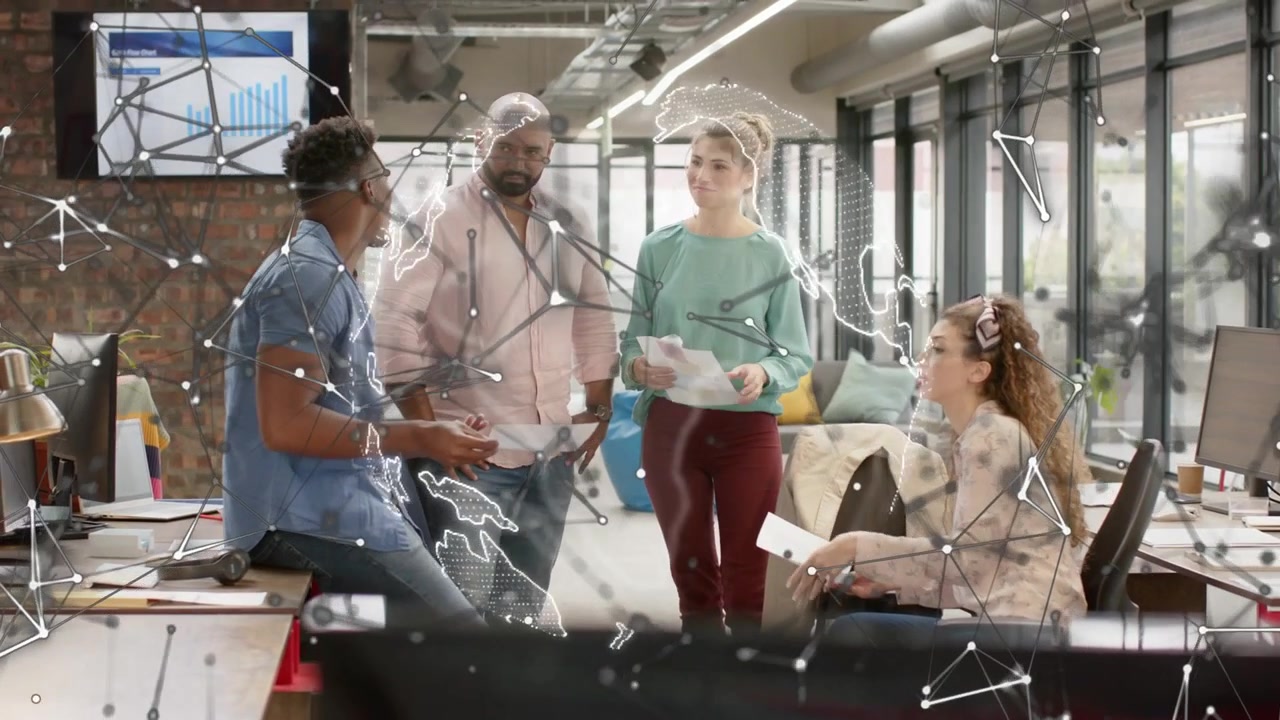 Vertical video: Man holding page, talking, team swapping pages as globe overlay fading for business