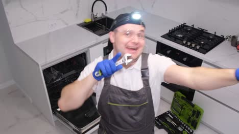 happy plumber in special clothes dancing at workplace happy plumber in special clothes dancing at workplace video slow motion