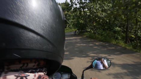 young-man-Driving-bike-in-Zarwani-Eco-Campsite,-Gujarat