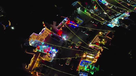 christmas lights over valencia neighborhood street, night cityscape aerial view