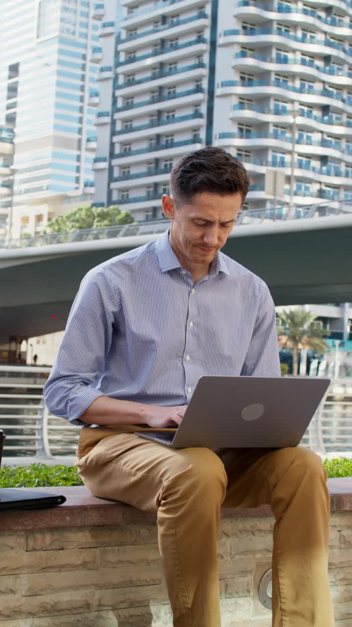 Businessman Working on Laptop in Dubai