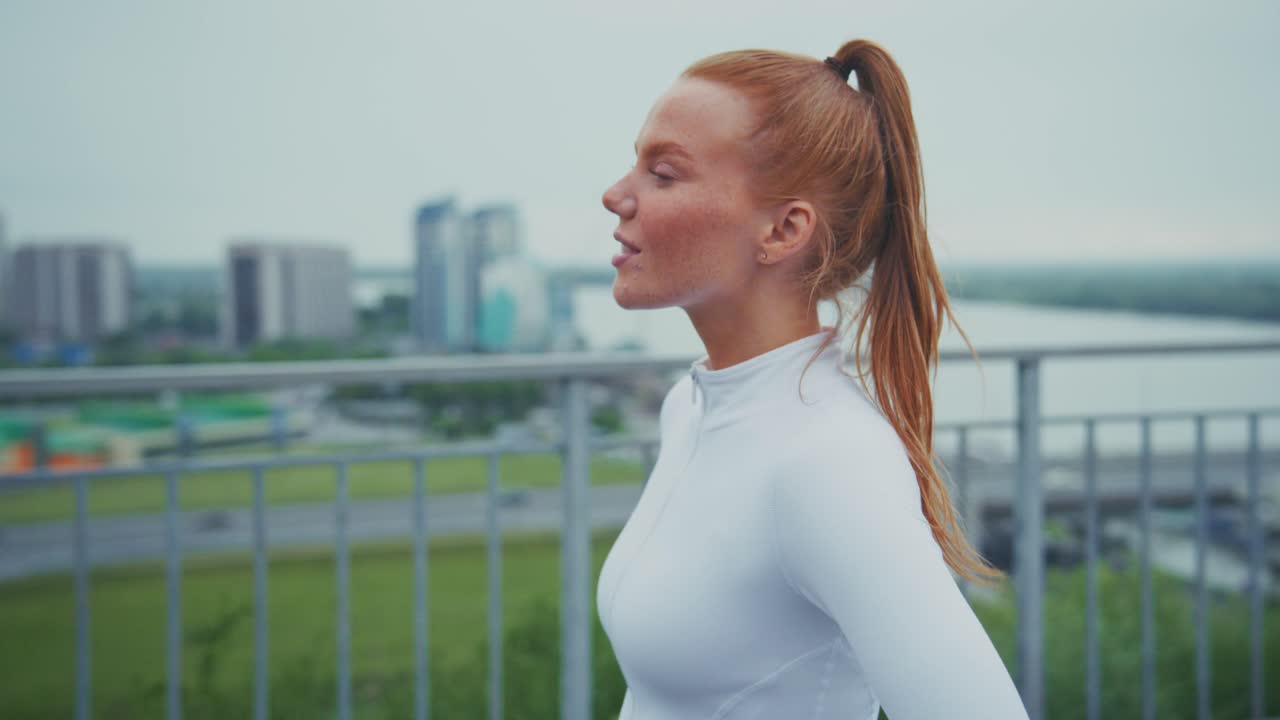 Redhead woman resting after exercise