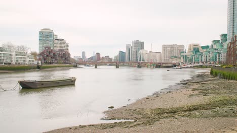 vauxhall bridge and the river thames with central london in the background