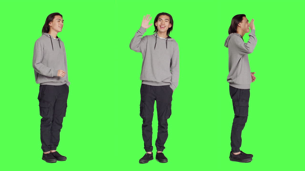 아시아 남자 가 사람 들 에게 인사 하고 있다