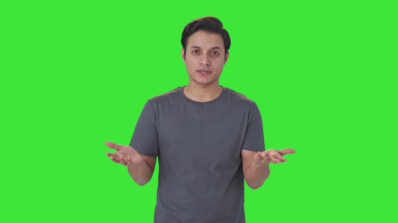 Indian man talking to the camera Green screen