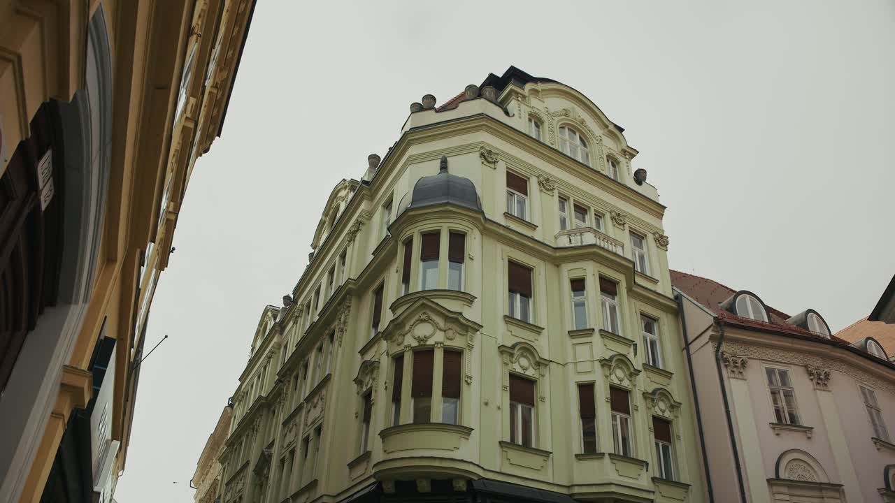 Elegant historic building with ornate facade and bay windows in Bratislava Old Town