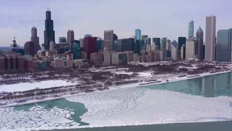 urban skyline of chicago and lake michigan on winter frosty day. aerial view. usa