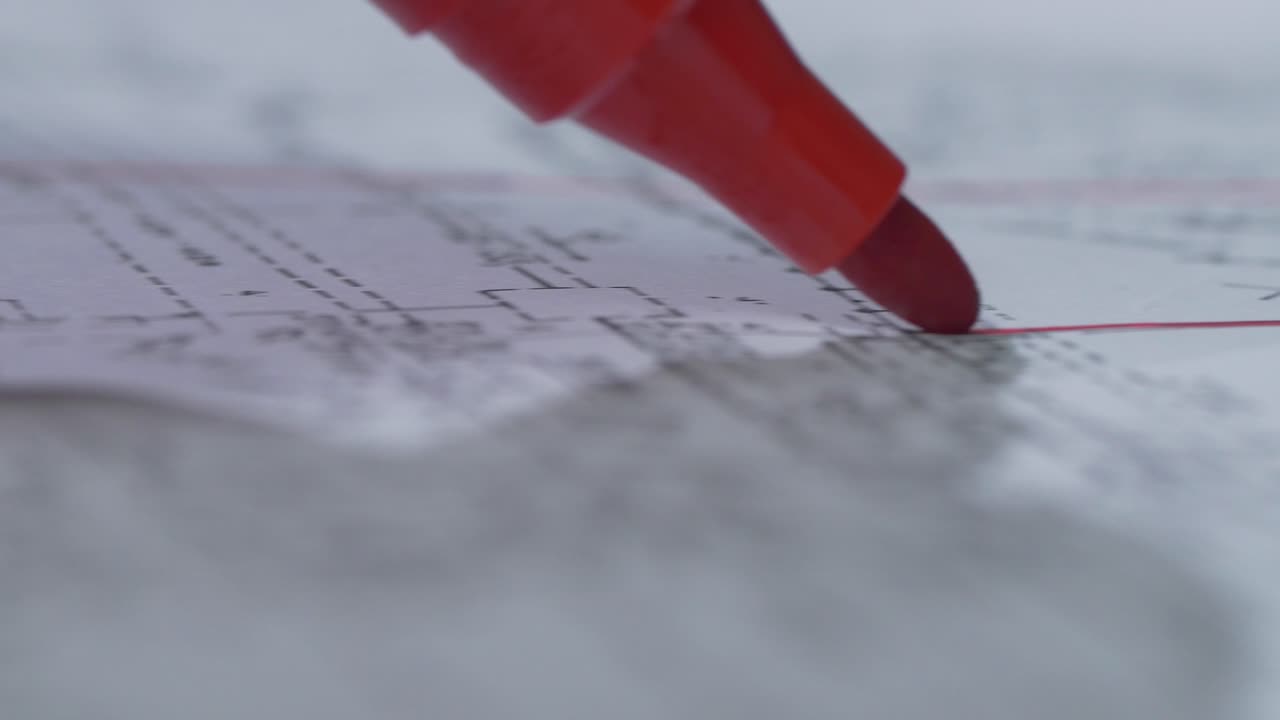Red Marker on Paper with Drawings
