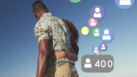 Animación-De-íconos-Digitales-De-Personas-De-Redes-Sociales-Sobre-Una-Pareja-En-La-Playa