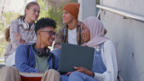 group of students studying together on campus