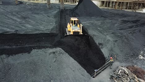 coal mining and processing. excavator car digging the ground works in construction site
