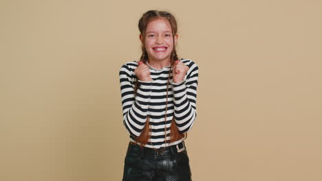 young preteen child girl kid celebrating success, winning, birthday lottery jackpot goal achievement