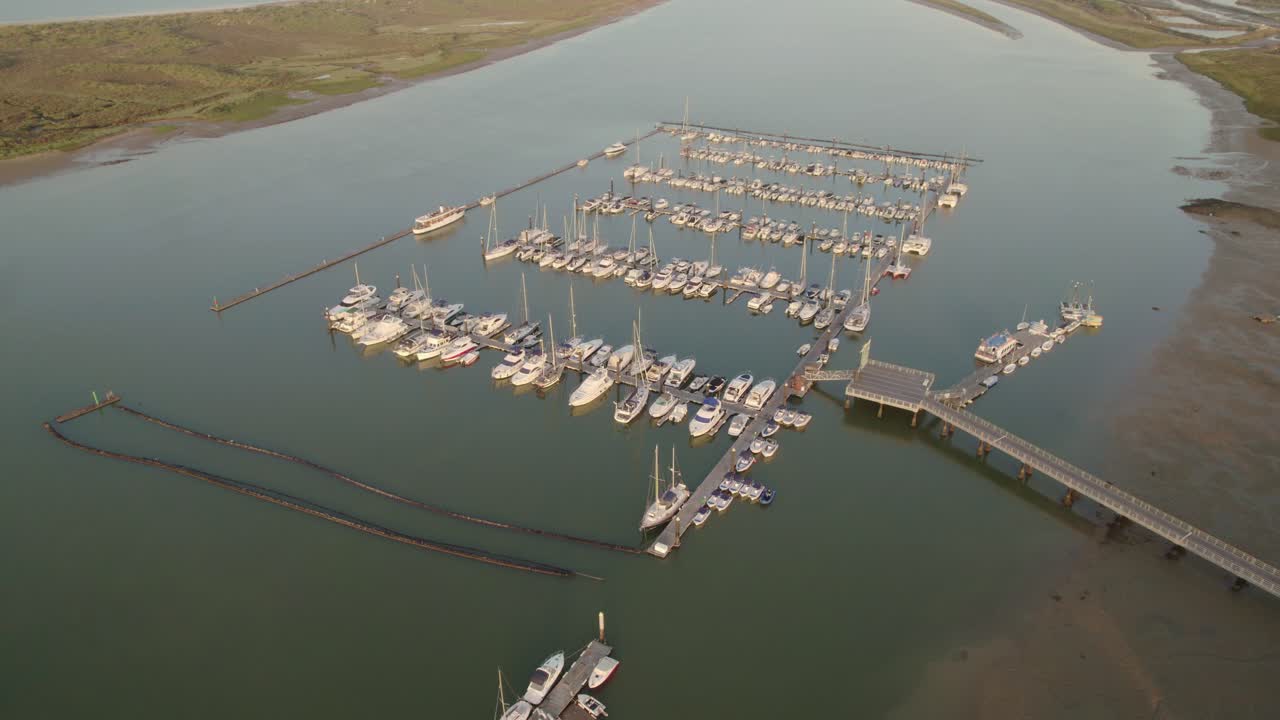 Marina at dawn during low tide