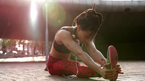 Front-view-of-young-African-American-woman-exercising-in-the-city-4k