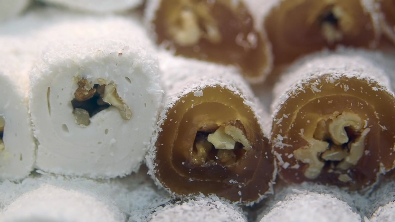 Traditional Turkish Delight Rolls with Walnuts and Coconut Flakes