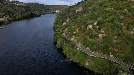 drone view of tejo river and its walkways along the coast