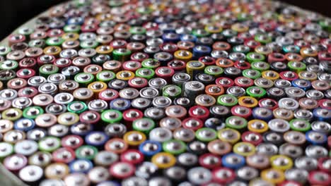 a large number of colored finger batteries a large number of colored finger batteries movement in a circle used aa batteries