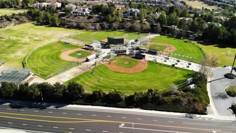 Aerial-panning-shot-of-little-league-baseball-fields-angle-3