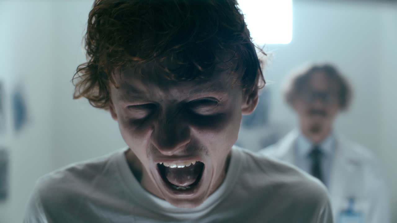 Portrait of Psychiatric Patient Screaming Emotionally in Hospital Ward