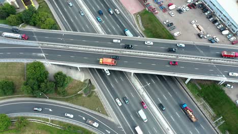 aerial view of highway junction with traffic, static camera locked down