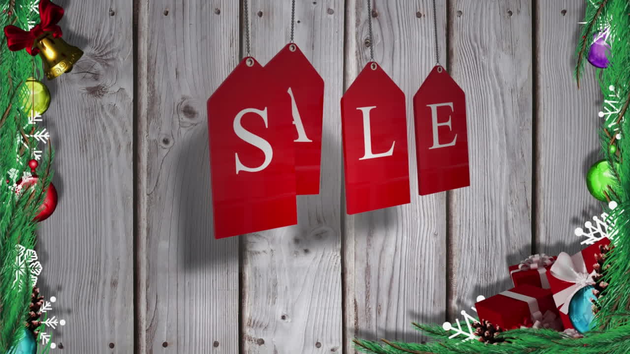 animación del texto de venta en etiquetas de navidad rojas sobre fondo de madera