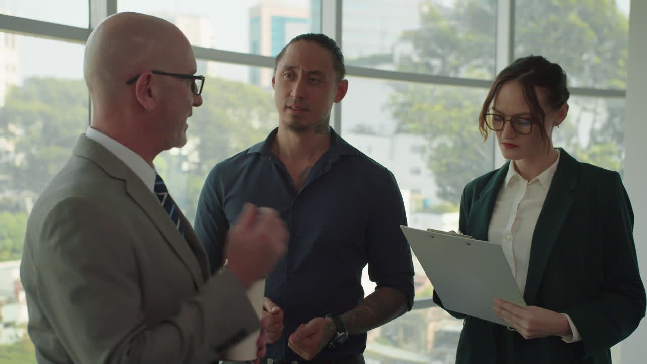 Businesspeople Chatting at Coworking Space